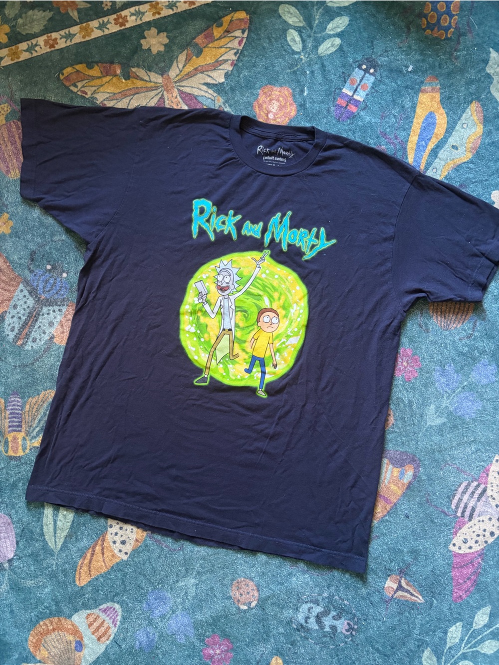 Ripple Junction Navy Rick and Morty Graphic Tee with Bright Green Portal